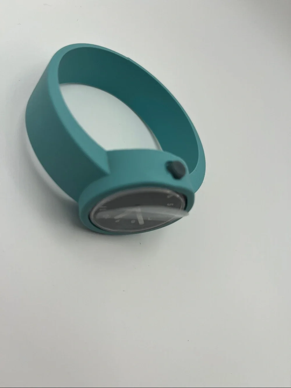 O bag O clock Modular Silicone Watch with a mint green strap